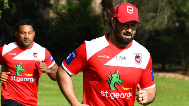 Aaron Woods slogs it out at pre-season training.