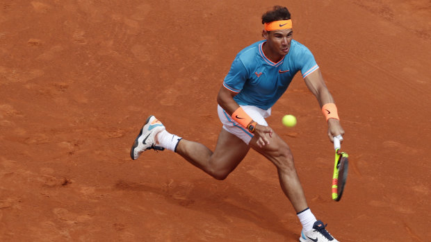 Rafael Nadal defeated compatriot David Ferrer in Barcelona.