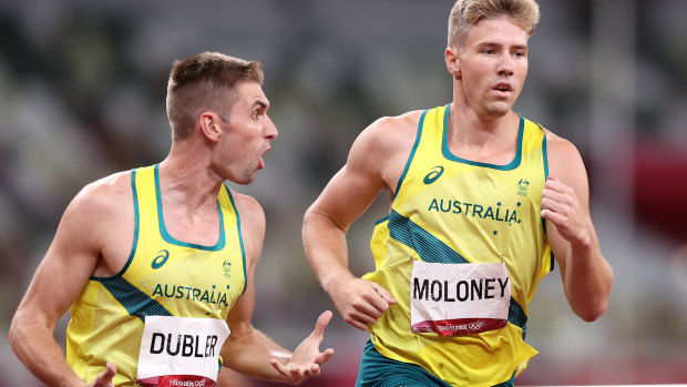Ash Moloney is encouraged by teammate Cedric Dubler in the last event of the decathlon.