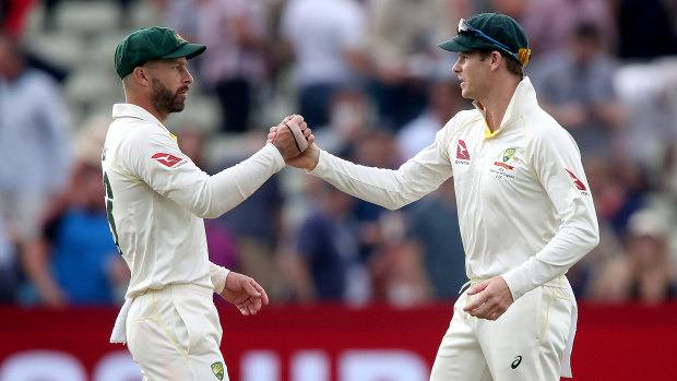 Steve Smith, right, is banned from leadership roles until next March by Cricket Australia.