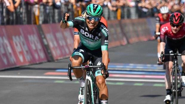 Italy's Cesare Benedetti celebrates a rare victory after winning the 12th stage of the Giro.