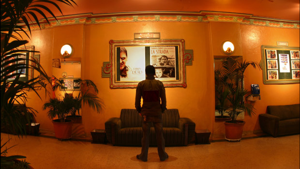 A patron surveys the Astor's offerings in 2005. 