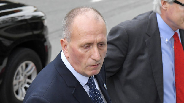 Vernon Unsworth, left, arrives for the trial with his lawyer, L. Lin Wood.