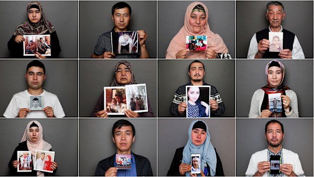 Uighurs residents in Australia hold photos of relatives who are missing in China. 
