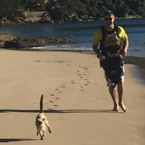 Gus joins his human, Glenn Druery, on a beach run. 
