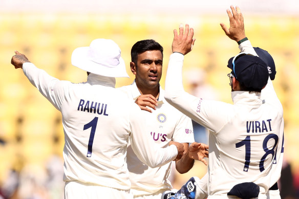 Ravichandran Ashwin and India celebrate a wicket.