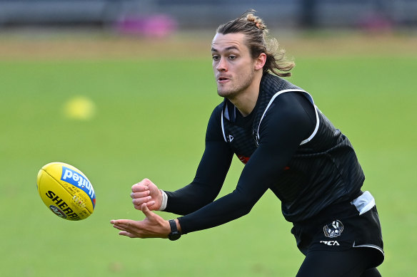 Collingwood defender Darcy Moore signed a new contract after the pay freeze.