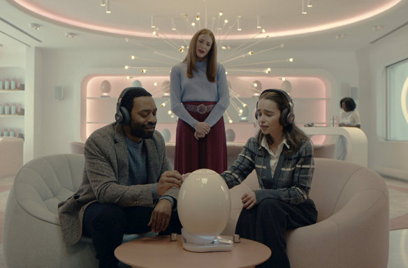 Chiwetal Ejiofor, from left, Rosalie Craig and Emilia Clarke appear in a scene from The Pod Generation, a film by Sophie Barthes.