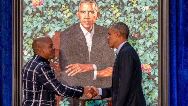 Kehinde Wiley painted a pensive Barack Obama in front of a lush background of flowers representing parts of the former president's life story. 