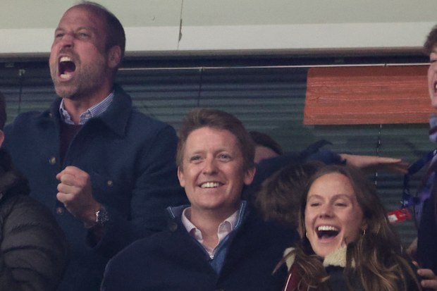 Hugh Grosvenor, Duke of Westminster and Olivia Grosvenor, Duchess of Westminster, with Prince William, Prince of Wales, celebrate a goal by Aston Villa during the UEFA Champions League 2024/25 Quarter Final against Paris Saint-Germain at Villa Park on April 15, 2025 in Birmingham, England.