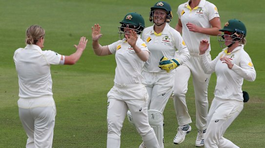 Australia celebrate the wicket of England's Anya Shrubsole, stumped by Alyssa Healy off Jess Molineux at Taunton on Sunday.