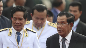 Cambodian Prime Minister Hun Sen, right, says his government has defeated an attempt at a coup.