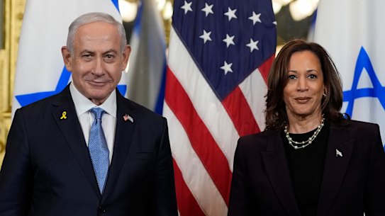 Vice President Kamala Harris, right, poses for a photo with Israeli Prime Minister Benjamin Netanyahu.