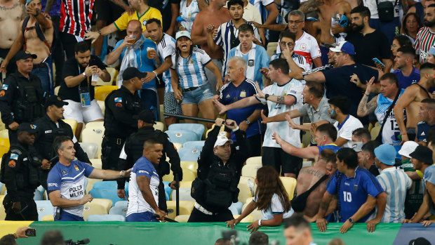 Violent clash between police, fans delays Brazil-Argentina clash