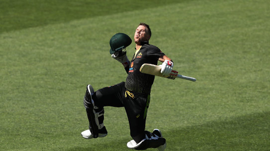 Back in black: Australian batsman David Warner celebrates reaching his century in the T20 series opener against Sri Lanka at Adelaide Oval.