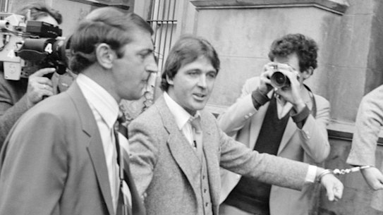 Christopher Dale Flannery (second from left) entering court.