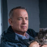 Tom Hanks, aka Tom Hanks the novelist, with feline friend in A Man Called Otto.
