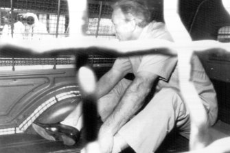 Tom Uren sits in the back of a police van after being arrested in Brisbane in January 1979, one of several encounters with the regime of Joh Bjelke-Petersen.