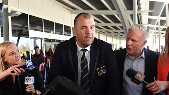 Outgoing Wallabies coach Michael Cheika arrives at Sydney Airport on Tuesday.