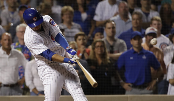 Chicago Cubs' David Bote hits the game-winning grand slam. 