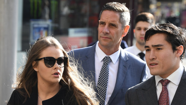 Sarah Rogers and Roman Quaedvlieg arrive at the Downing Centre court in Sydney on Thursday with solicitor Bryan Wrench.