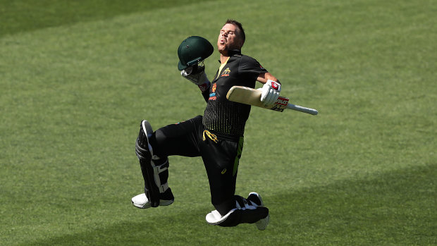 David Warner celebrates reaching his century in the T20 series opener against Sri Lanka at Adelaide Oval.