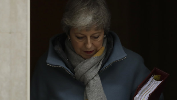 Britain's Prime Minister Theresa May leaves 10 Downing Street to attend the weekly Prime Minister's Questions session on Wednesday.