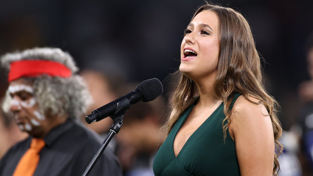 Olivia Fox sings the national anthem at Bankwest Stadium on Saturday evening. 