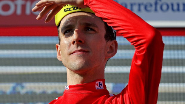 "I'll try to stay focused now and of course enjoy the day, but really it's not over until it's over": Simon Yates,