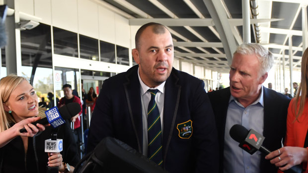 Outgoing Wallabies coach Michael Cheika arrives at Sydney Airport on Tuesday.
