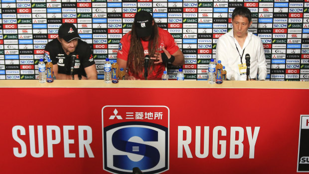 Jettisoned: Sunwolves coach Tony Brown, captain Dan Pryor and CEO Yuji Watase address the media in Singapore after their axing.