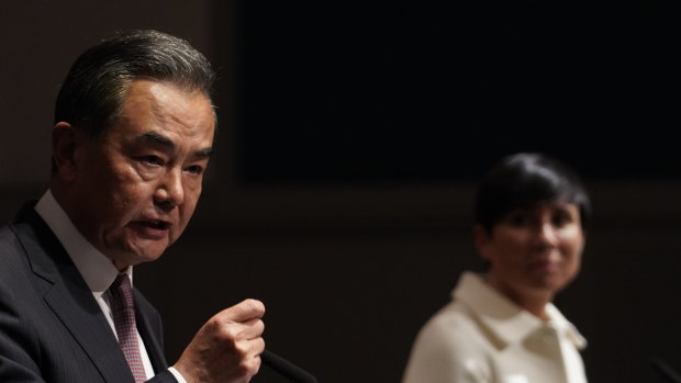 Chinese Foreign Minister Wang Yi, left, and Norwegian Foreign Minister Ine Eriksen Soreide hold a press conference after political talks they had earlier in the evening in Oslo.