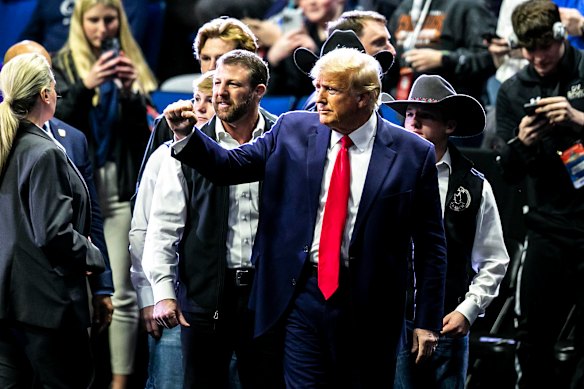 Donald Trump greets fans during the NCAA Wrestling Championships on Saturday in Tulsa, Oklahoma.