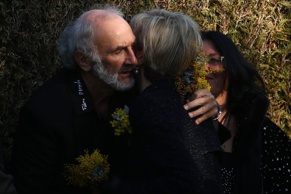 Bishop hugs Jerzy Dyczynski, father of one of the victims, at the National Memorial Service for MH17 in Canberra in 2015.