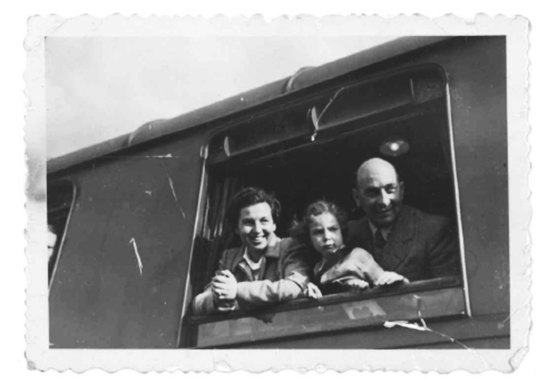Janet Malcolm with her parents as they leave Czechoslovakia.