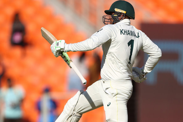 Khawaja celebrates.