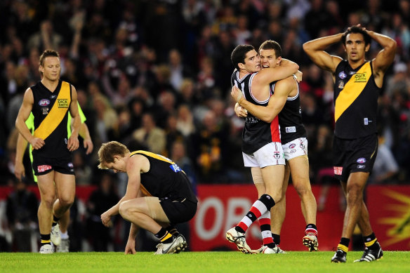 Luke Ball and Leigh Montagna celebrate as Jack Riewoldt rues his post siren kick to win the match dropped short.