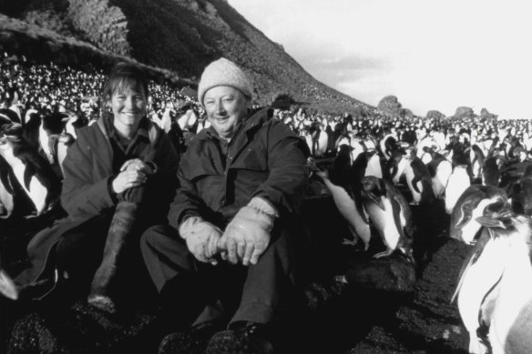 Tim Bowden with biologist Mary-Anne Lea and a huddle of Royal Penguins at Hurd Point, Macquarie Island in 1996.