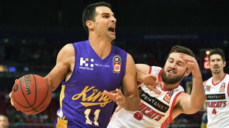 Downtown: Kevin Lisch of the kings competes for possession against Mitchell Norton.