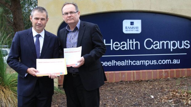 Health Minister Roger Cook and Mandurah MP David Templeman at the Peel Health Campus before the state election in 2017. 