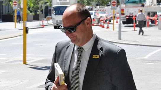 Barry Urban leaves court in 2018.