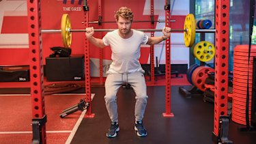 Physiotherapist Luke Pickett performing a squat.