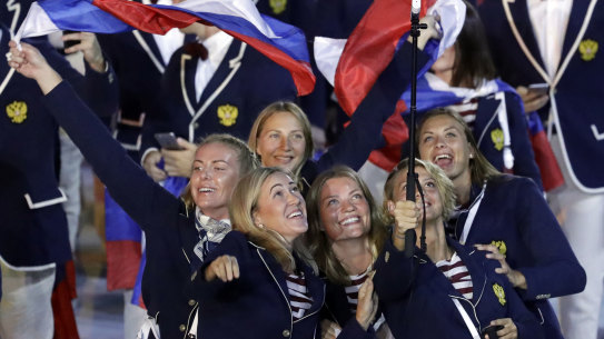 Team Russia athletes arrive at the opening ceremony for Rio 2016. An IOC member believes athletes should be prioritised for vaccination so the Tokyo Games can go ahead.
