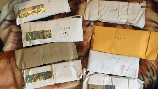 A photo of the envelopes containing bundles of cash which Ibrham Helmy sent to his friend Adam Taki in 2015.