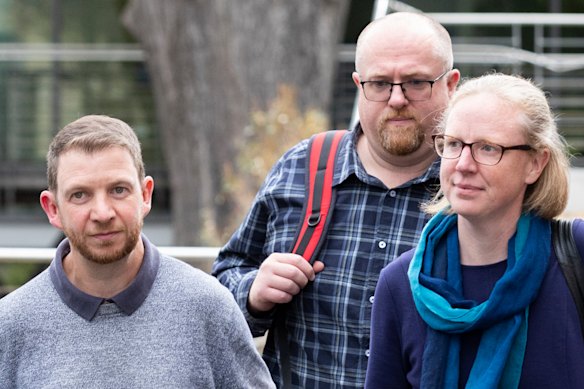 Josh and Anna-Marie Terrington and Matthew Patterson (centre) leave the court.