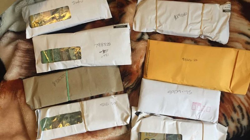 Accused mastermind showed off bundles of cash in kickbacks to his mate