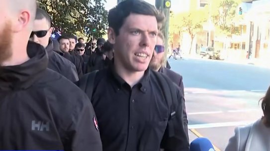 “Proud to be racist”: Jack Eltis being interviewed by a reporter after the March for Australia rally.