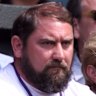 Damir Dokic watches his daughter play at Wimbledon in 2000.