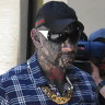 Colourful ex-bikie Dayne Brajkovich wins Perth court battle over gang tattoos, clothing