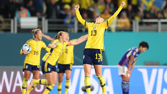 Sweden celebrate their quarter-final win over Japan.